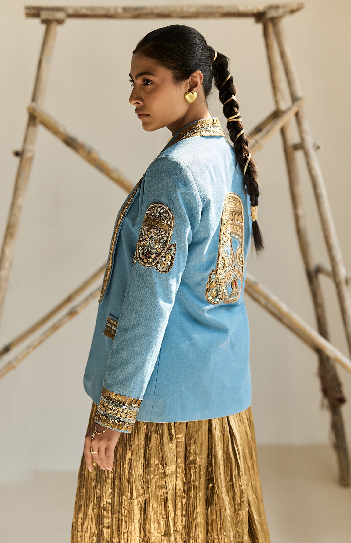 DENIM BLAZER WITH GOLD BUSTIER AND SILK JECQUARD CRUSHED LEHANGA