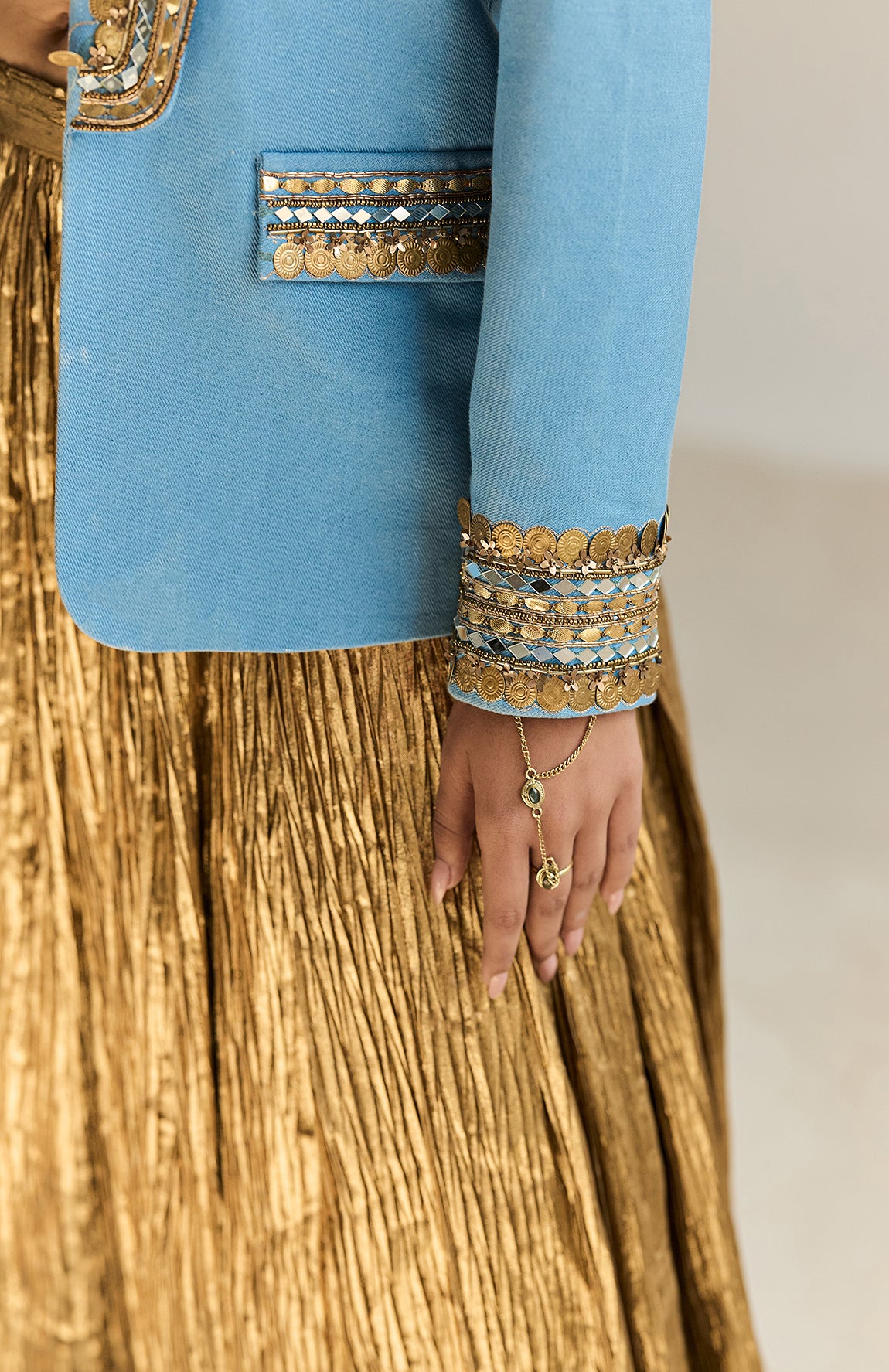 DENIM BLAZER WITH GOLD BUSTIER AND SILK JECQUARD CRUSHED LEHANGA