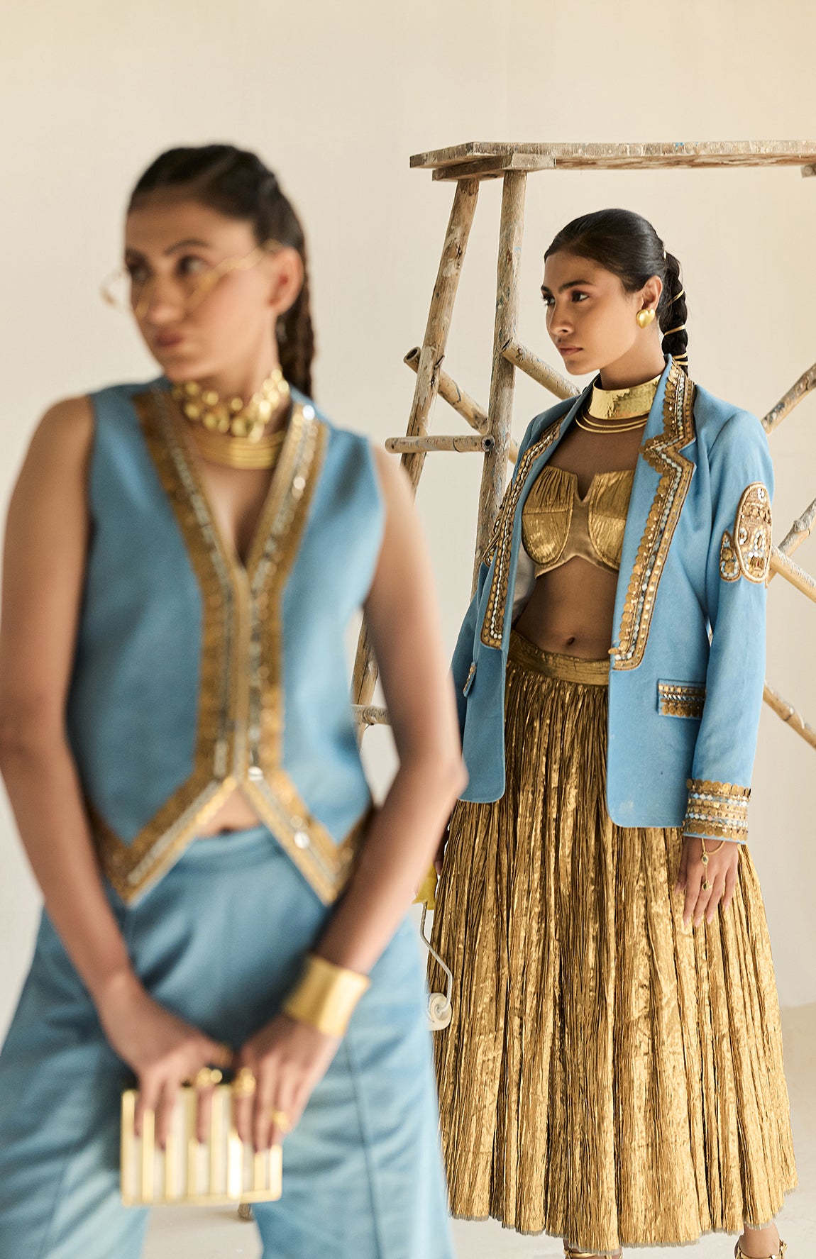 DENIM BLAZER WITH GOLD BUSTIER AND SILK JECQUARD CRUSHED LEHANGA