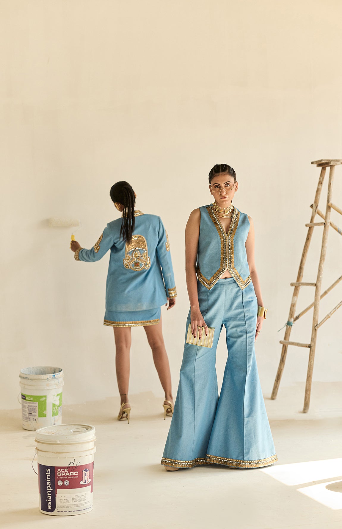 DENIM BLAZER WITH GOLD BUSTIER AND SILK JECQUARD CRUSHED LEHANGA