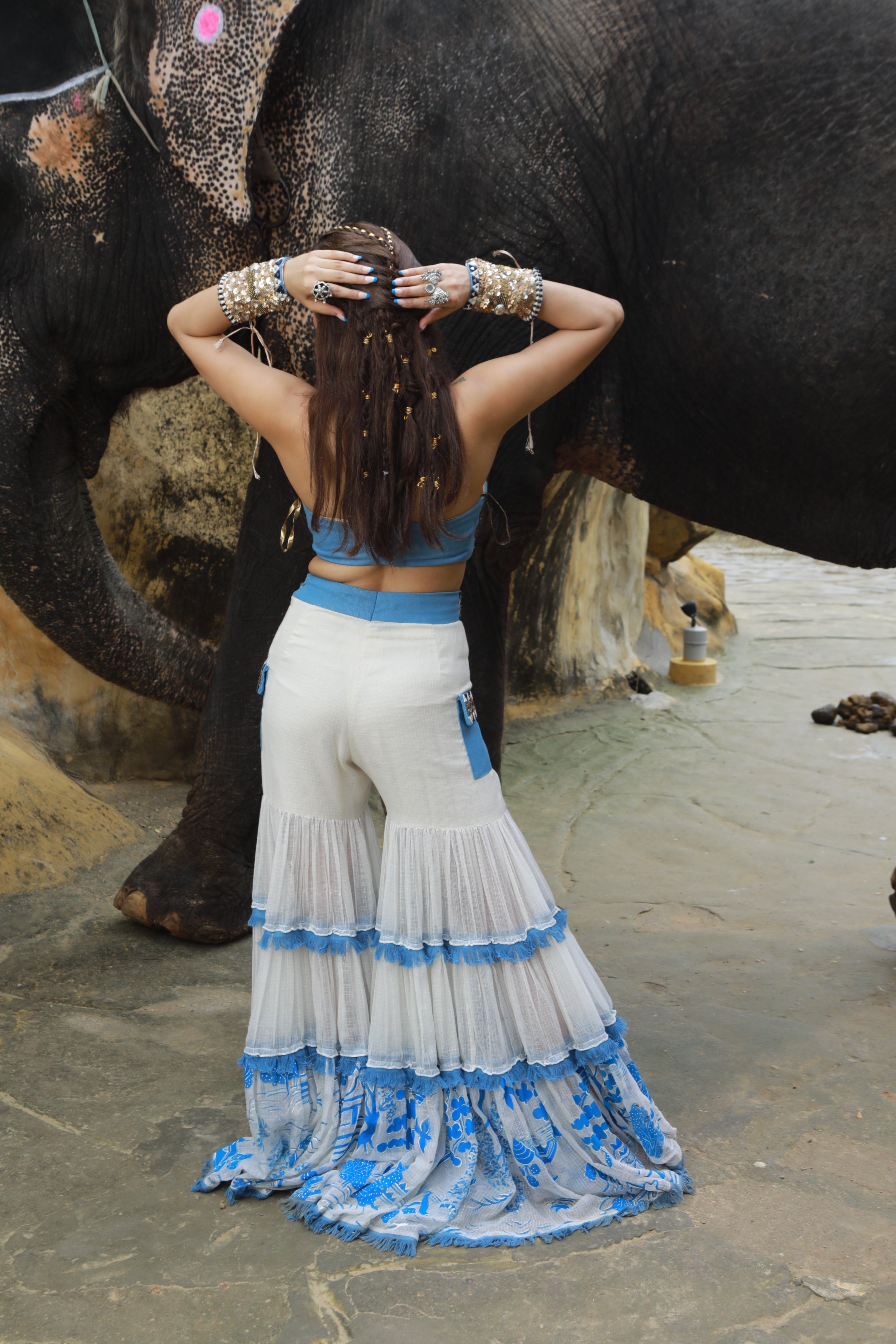 IVORY KOTA DORIA HAND PAINTED SHARARA WITH DENIM EMBELLISHED BUSTIER WITH IVORY HAND PAINTED EMBELLISHED  CAPE