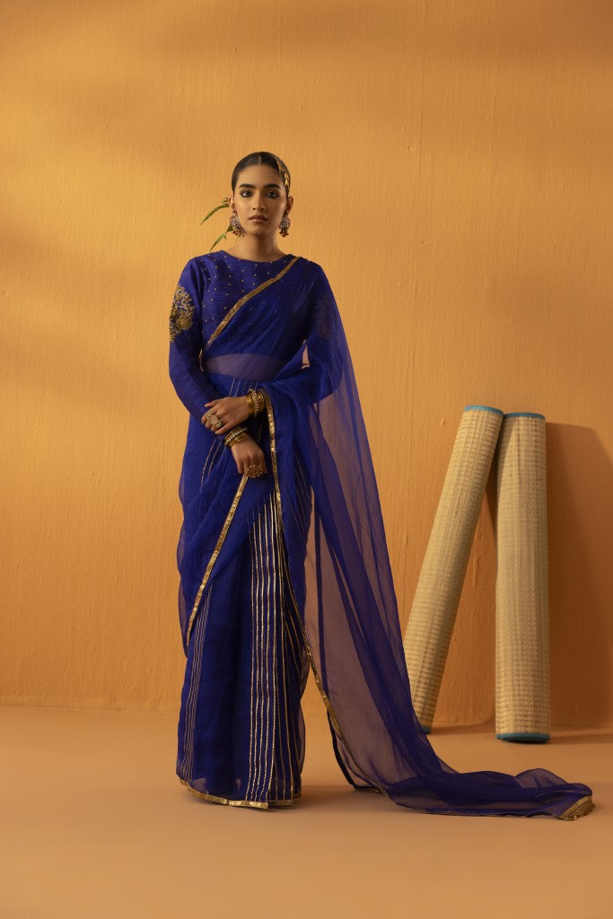 Neeltara magnetic blue embroidered saree set