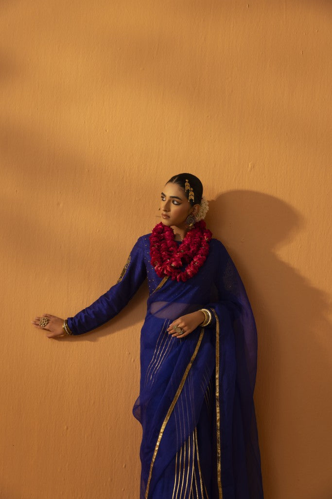 Neeltara magnetic blue embroidered saree set
