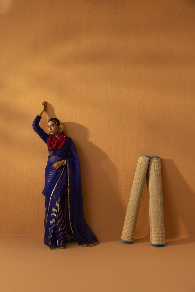 Neeltara magnetic blue embroidered saree set