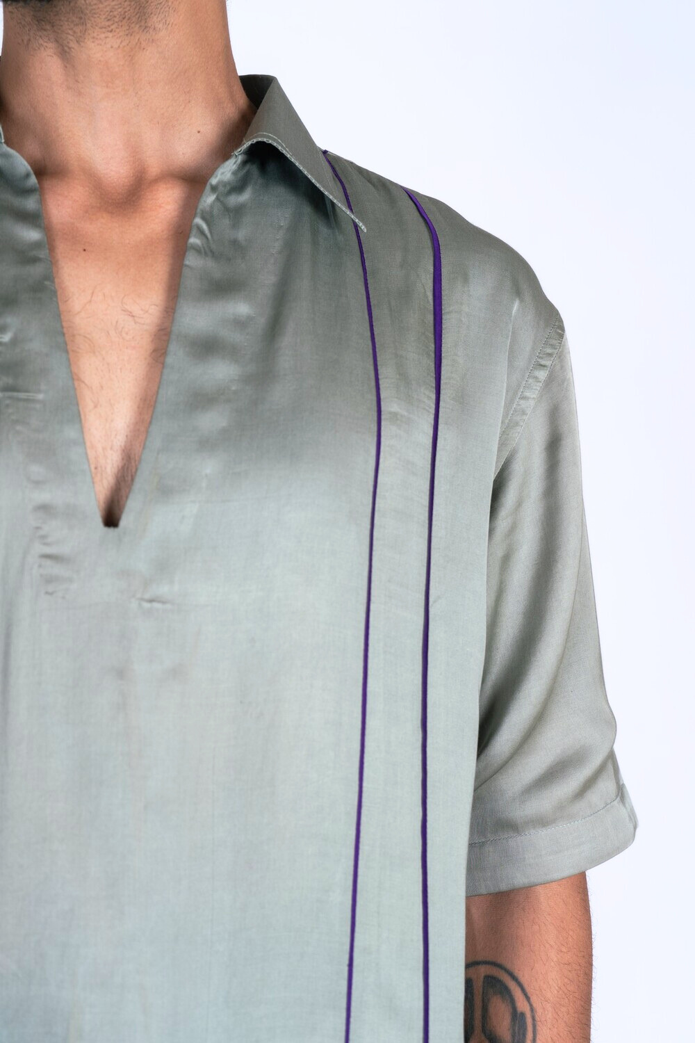Green Shirt with Purple Pipin