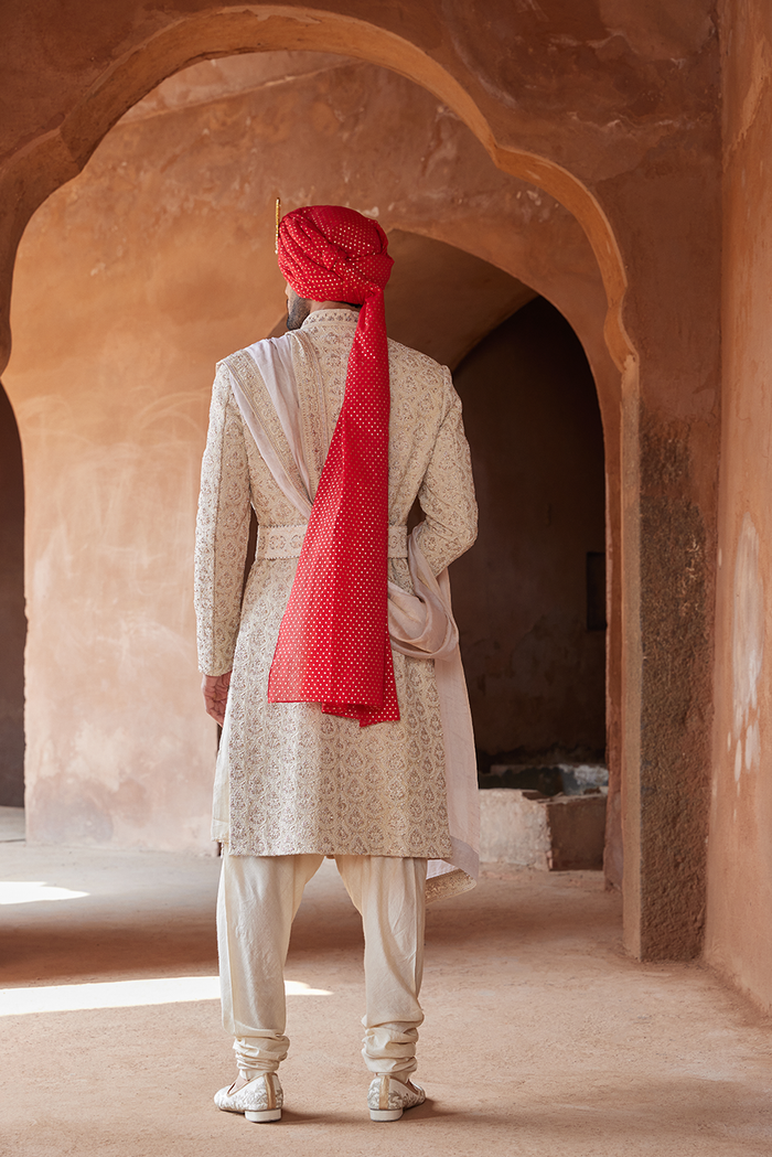 LIGHT BEIGE RAW SILK EMBROIDERED SHERWANI KURTA CHURIDAR SET