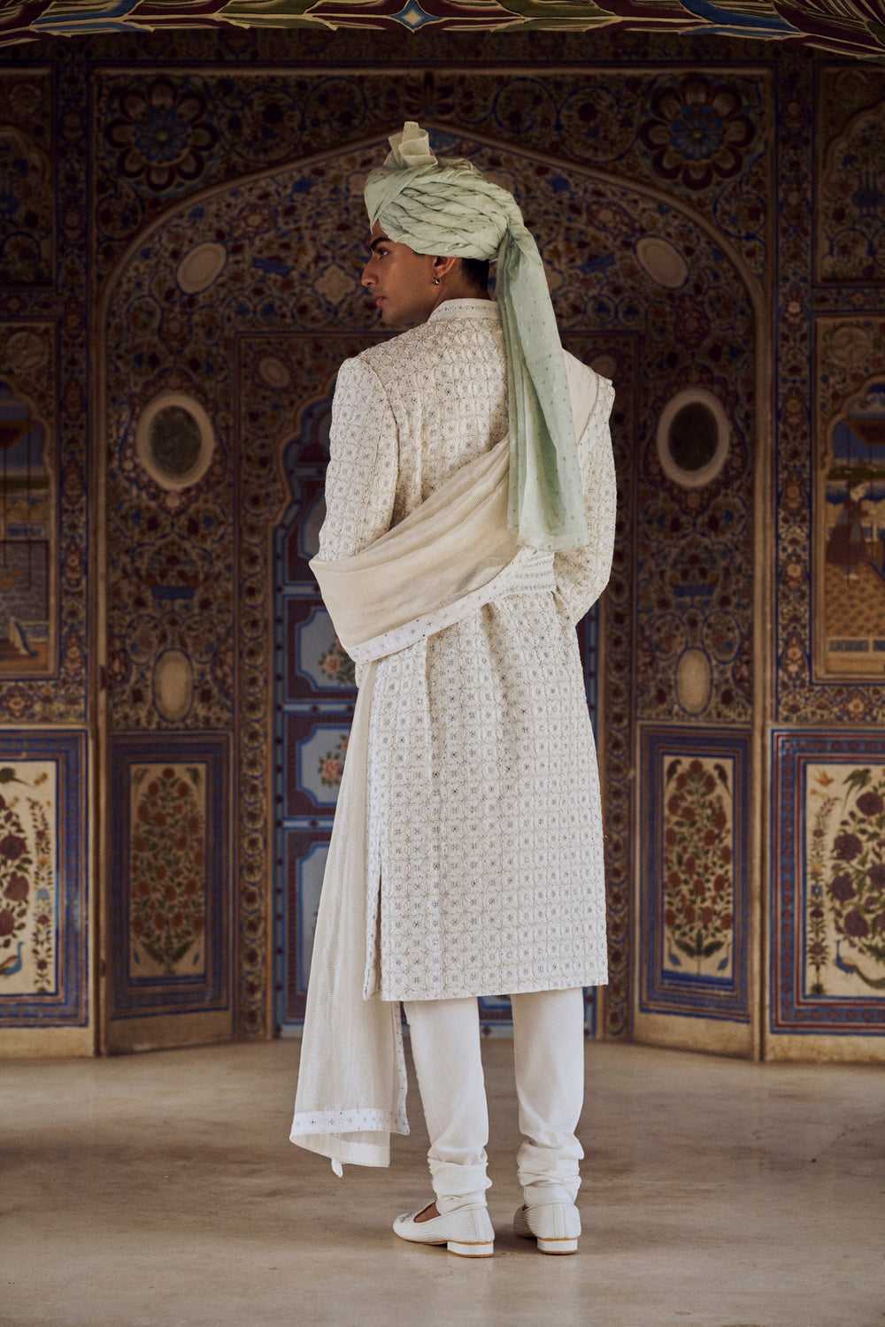 IVORY RAW SILK SHERWANI WITH KURTA CHURIDAR AND OPTIONAL STOLE BELT AND EMBROIDERED JUITS