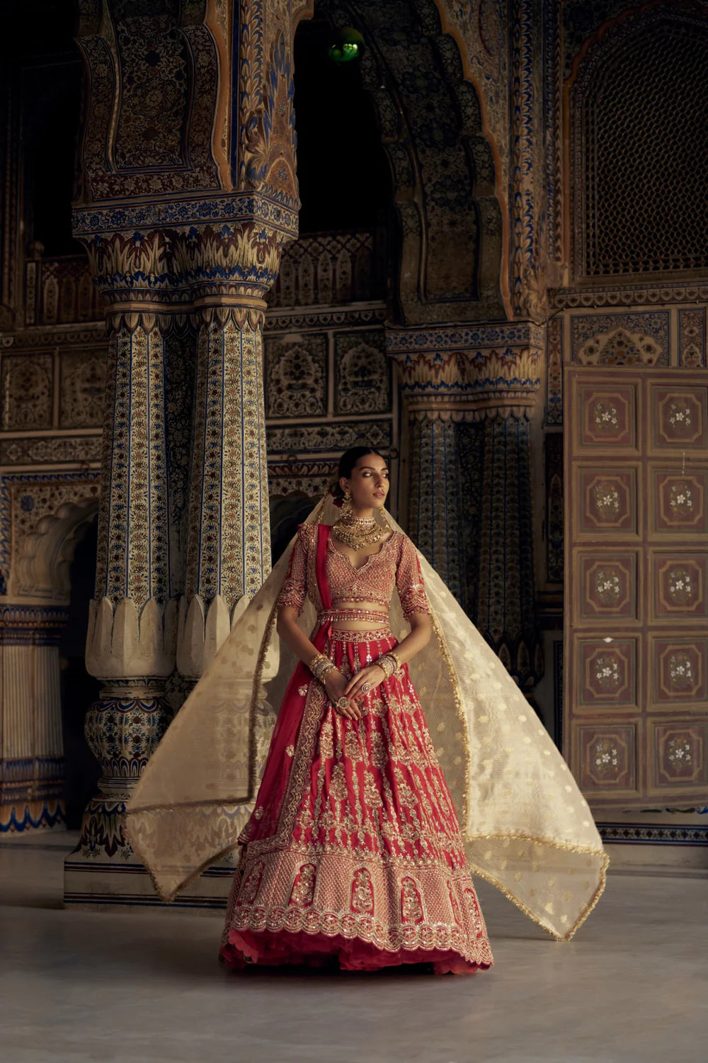 BLOOD RED SILK LEHENGA CHOLI SET WITH A WORKED TULLE DUPATTA