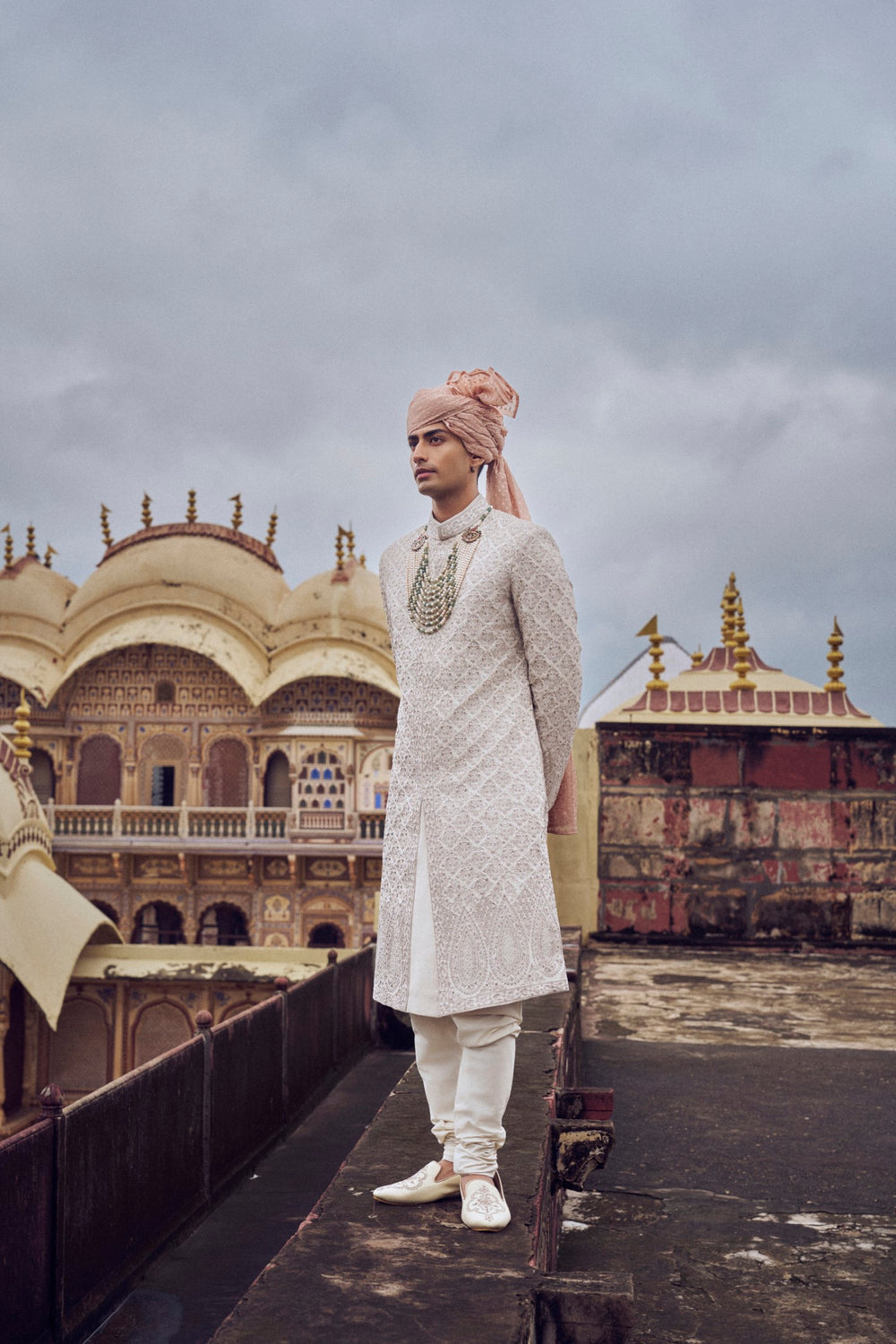 NUDE RAW SILK SHERWANI WITH KURTA CHURIDAR AND OPTIONAL WORKED STOLE, BELT AND JUTI
