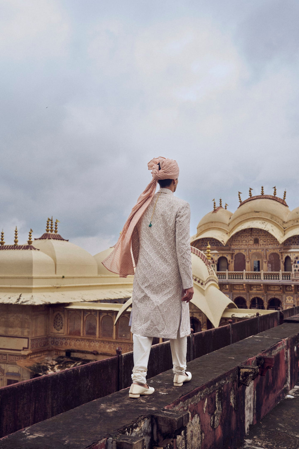 NUDE RAW SILK SHERWANI WITH KURTA CHURIDAR AND OPTIONAL WORKED STOLE, BELT AND JUTI