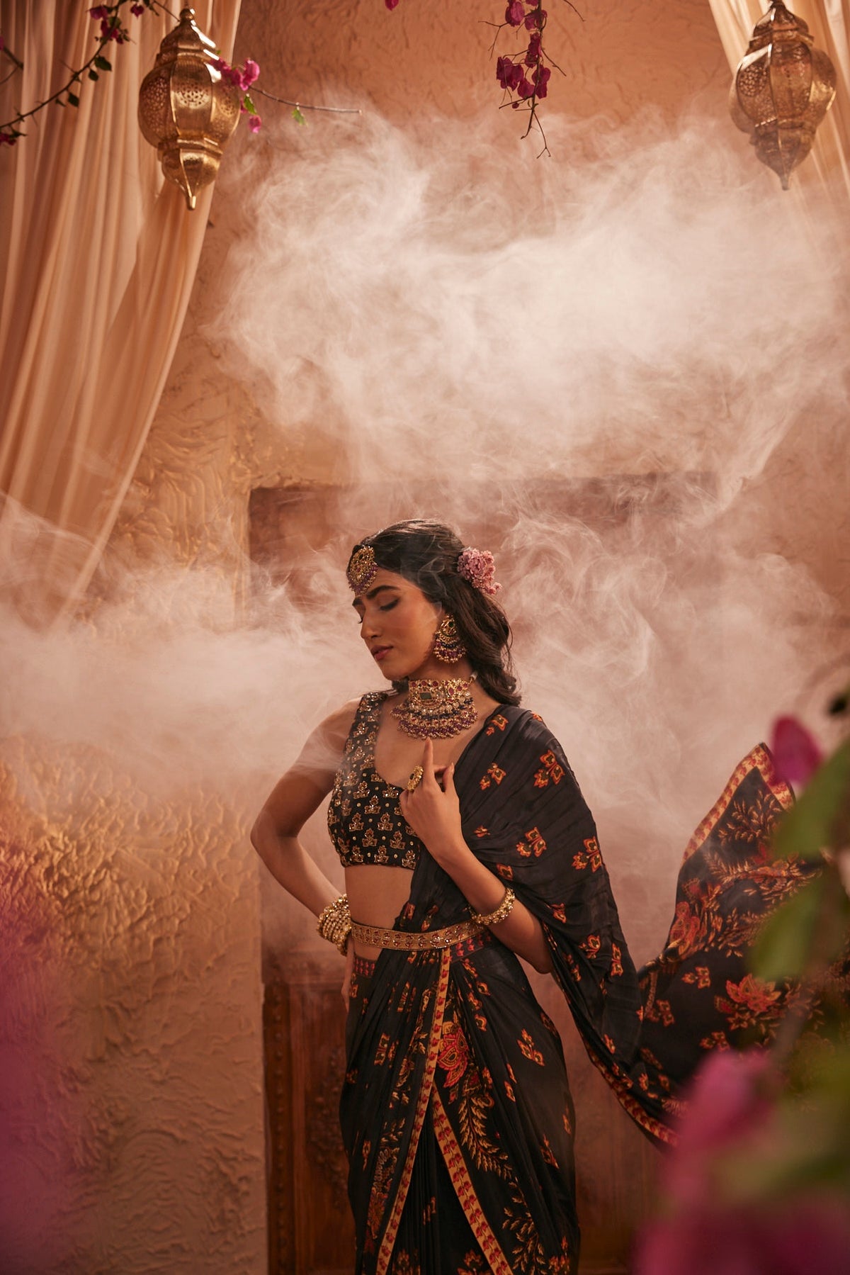 Black Saree Adorned Paired With An Intricately Embroidered Blouse