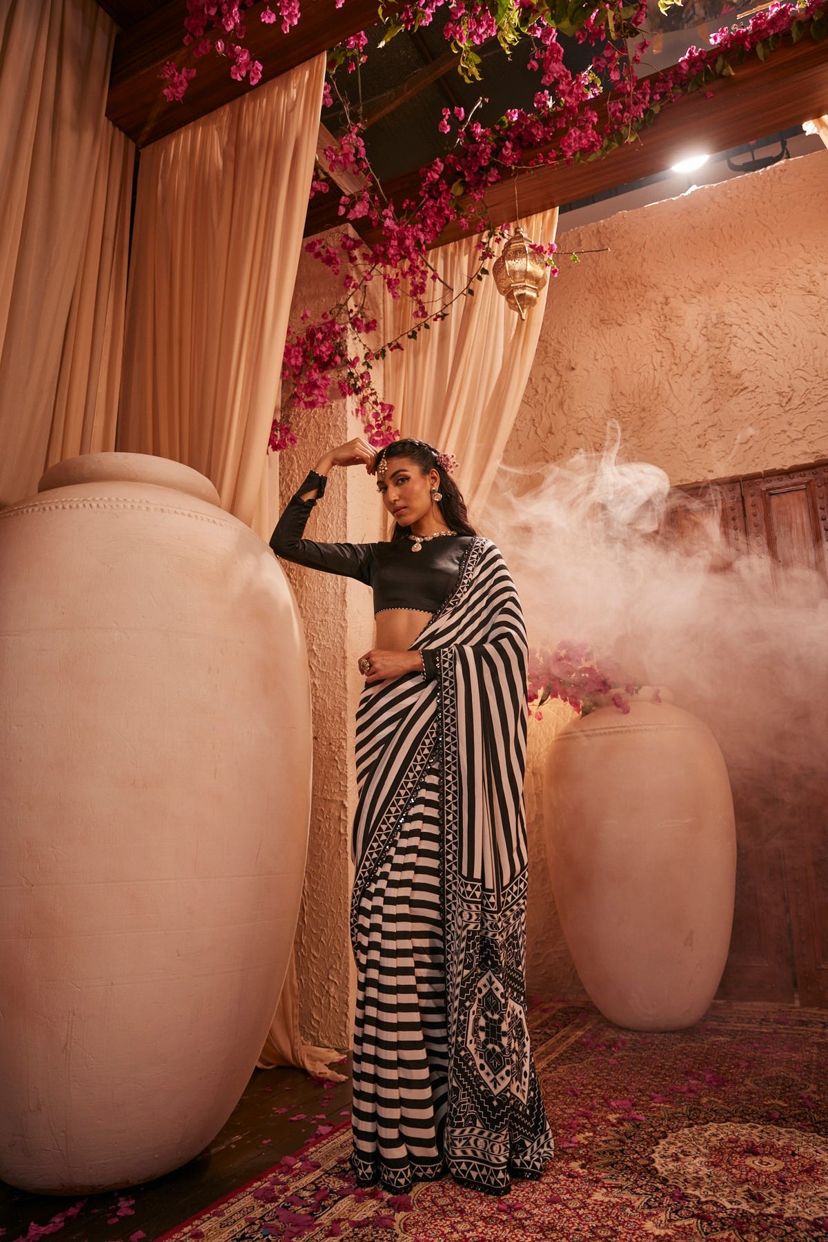 Black And White Saree With Intricate Motifs Paired With Black Full-Sleeved Blouse