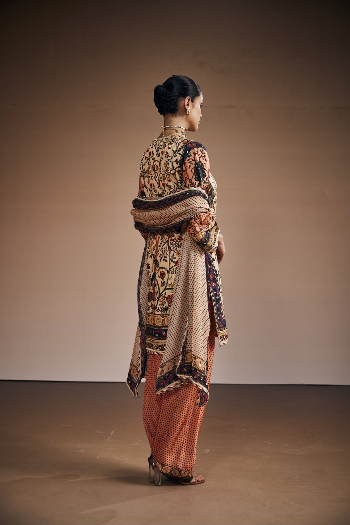 Ivory kurta set inspired with tree of life print.