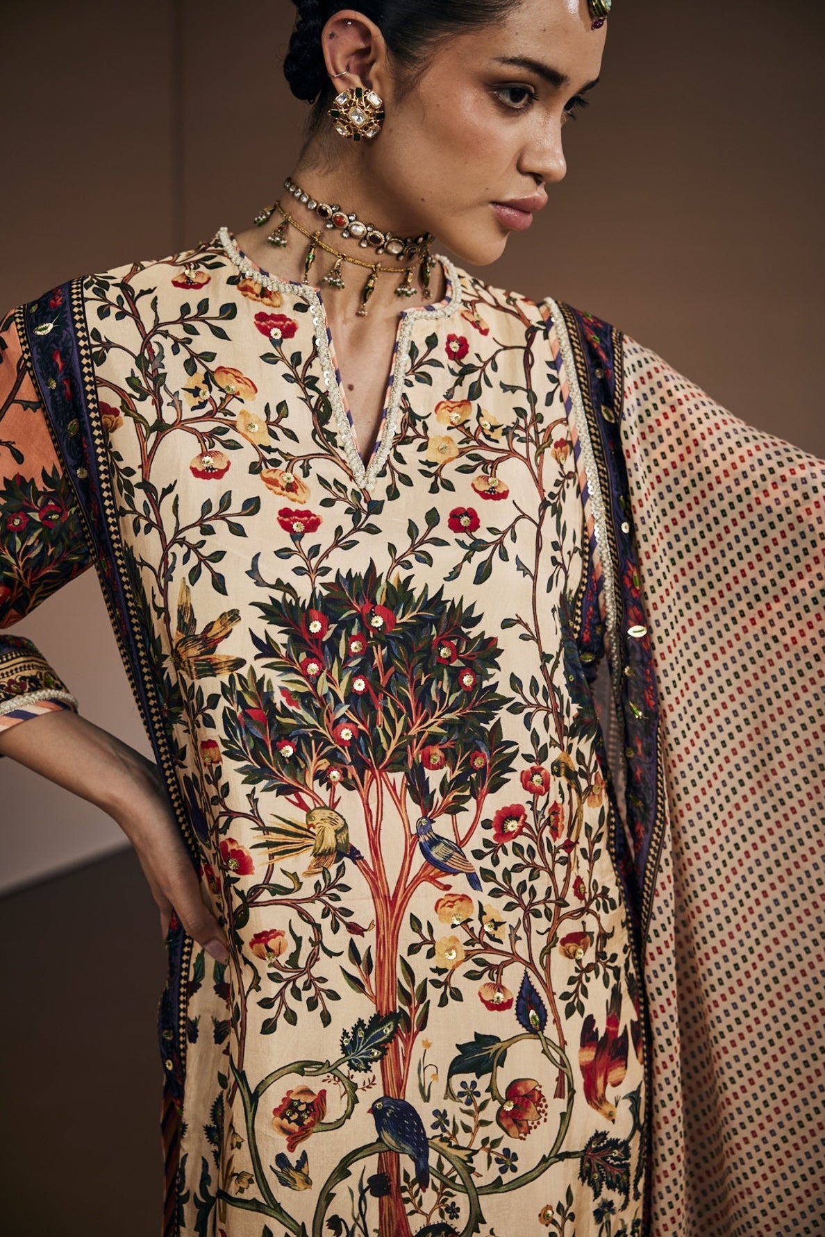 Ivory kurta set inspired with tree of life print.