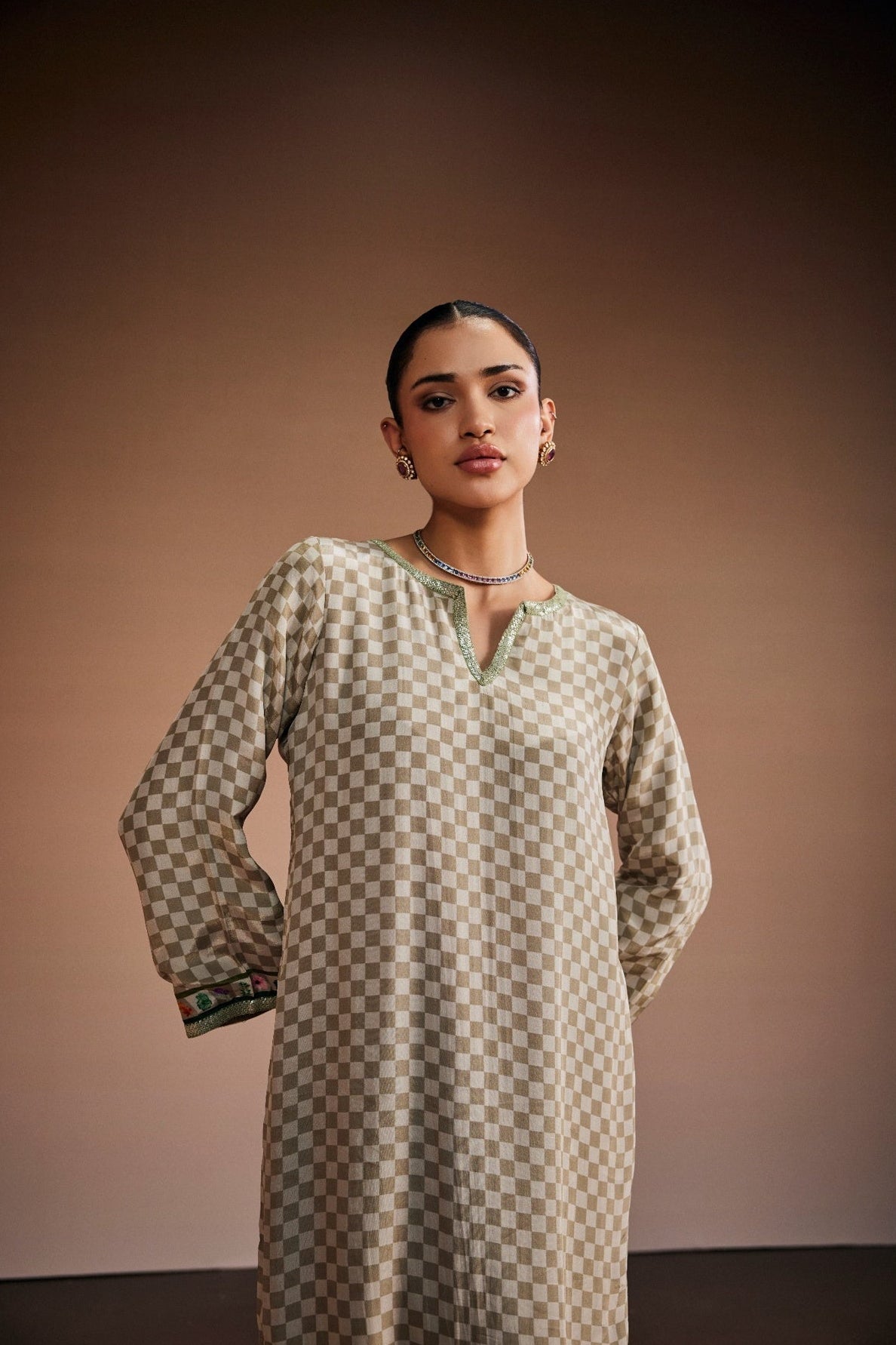 Long checkered tunic with a placement floral print border