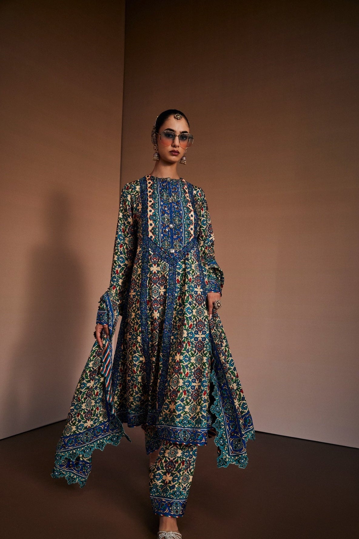 Floral printed anarkali paired with narrow pants and dupatta