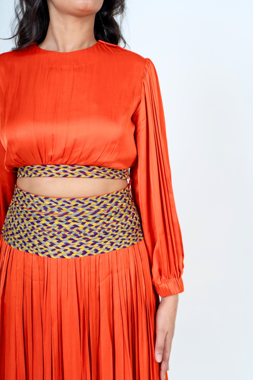 Orange Skirt Set with Color-Blocked Braids