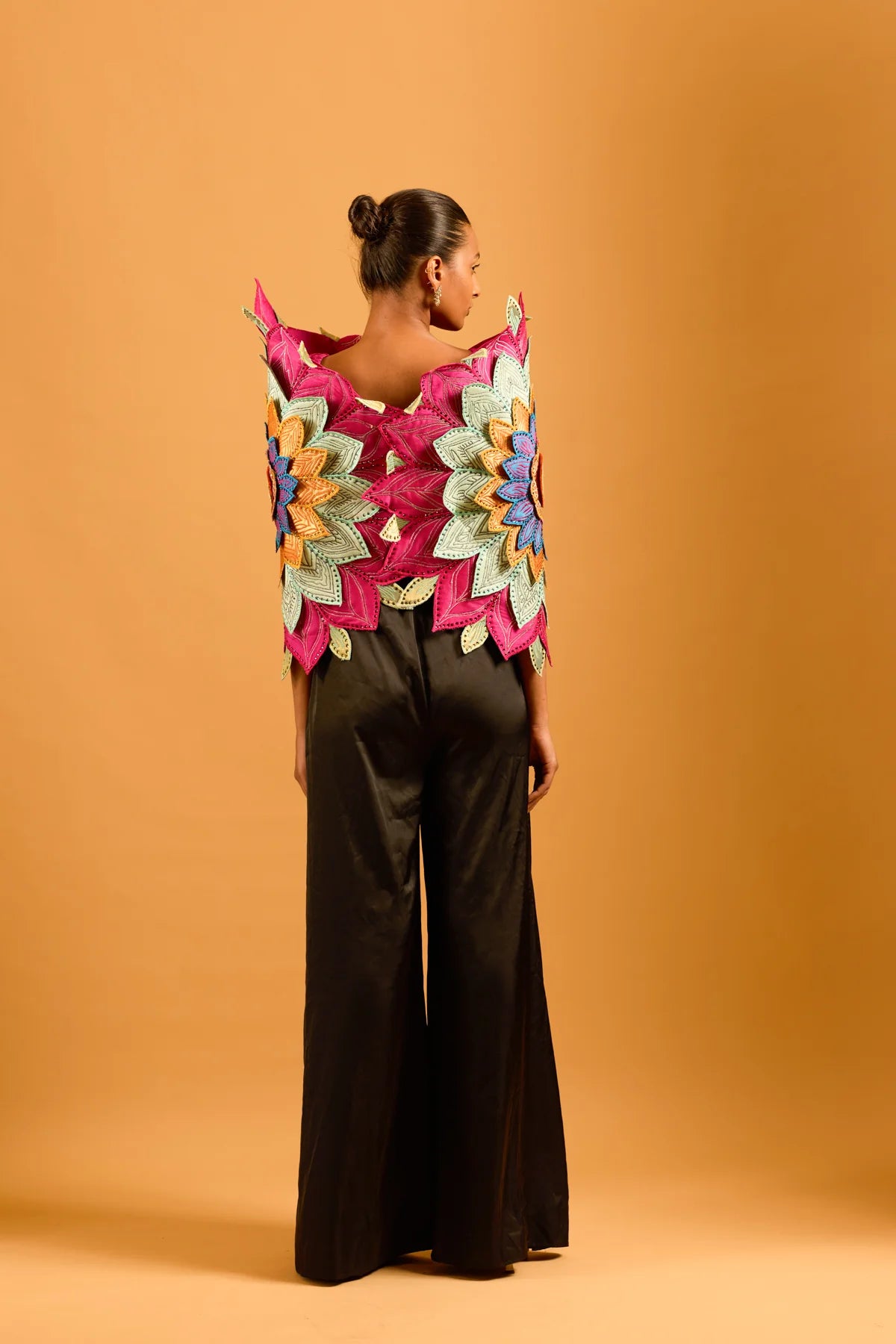 Trifecta black pleated pants with flower cape