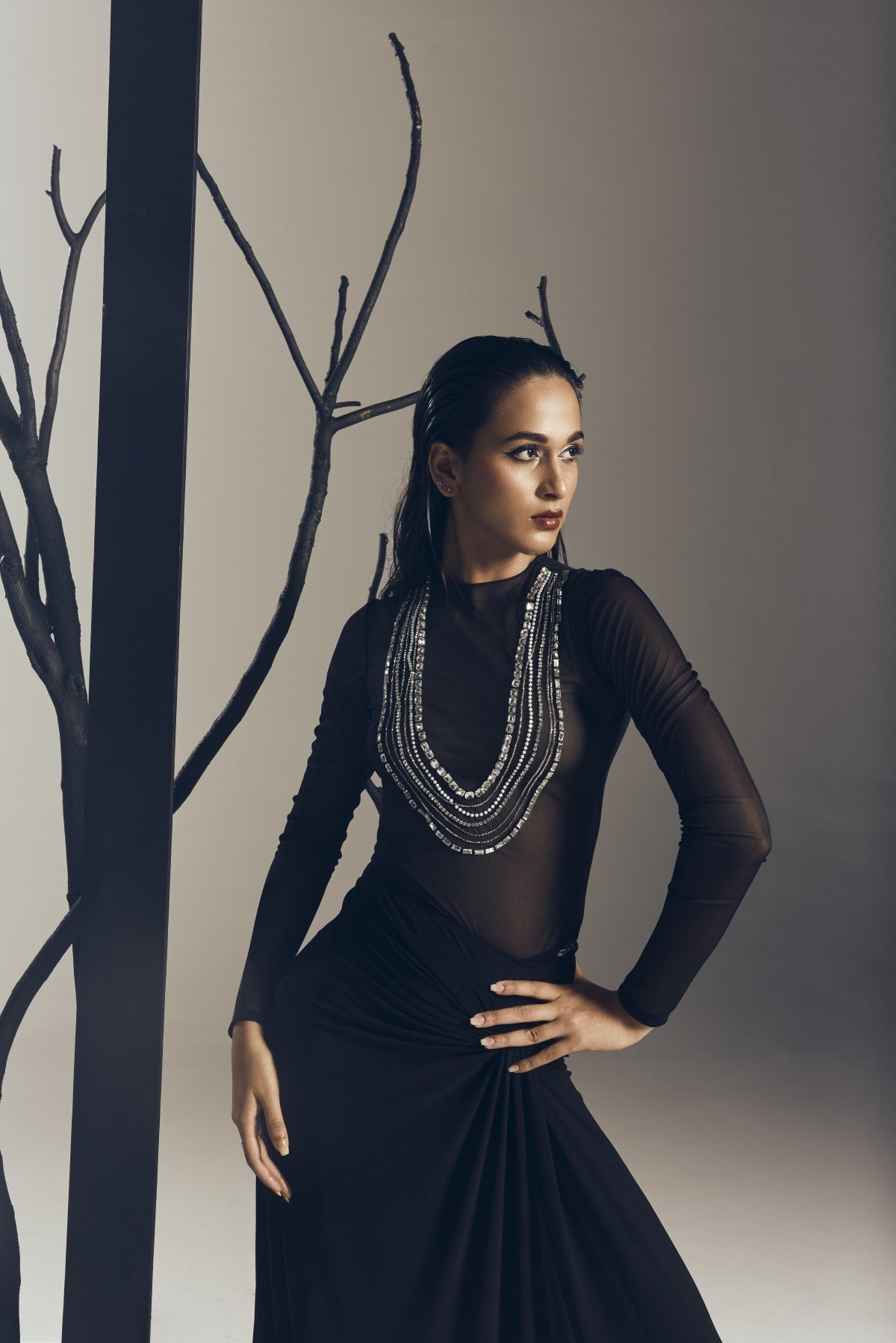 BODYSUIT WITH A LONG DRAPE SKIRT