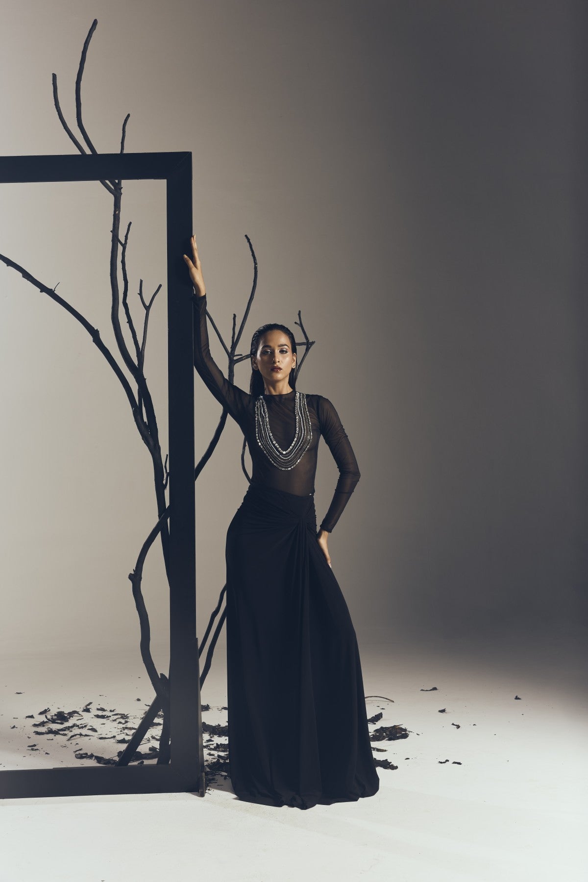BODYSUIT WITH A LONG DRAPE SKIRT