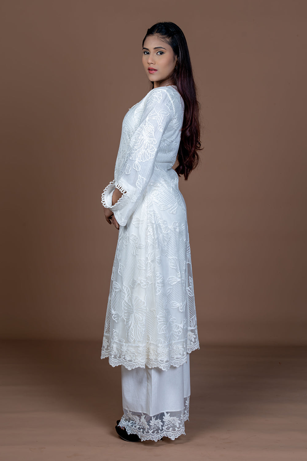 Lace embellished white kurta set paired with Kota doria dupatta