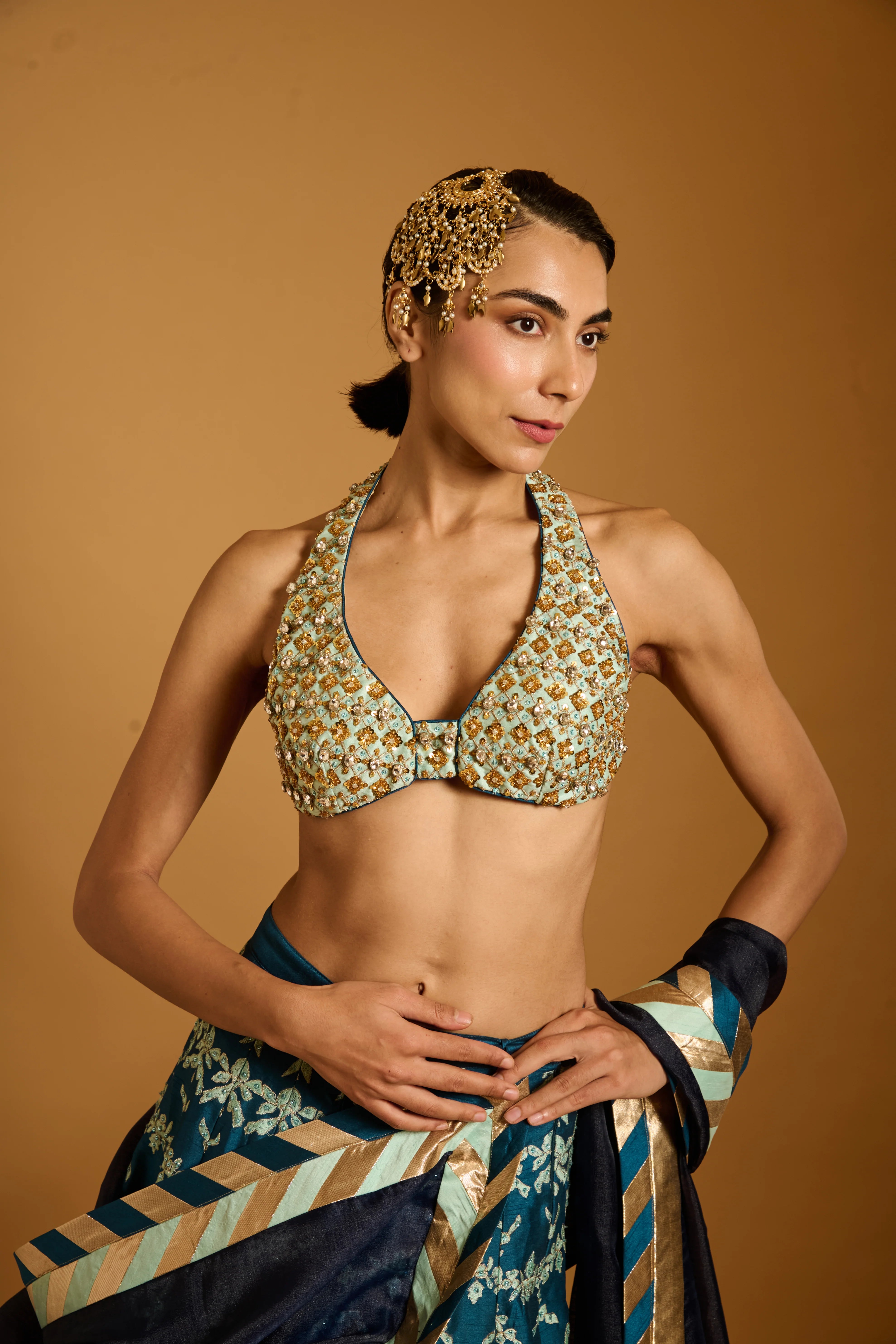 Trifecta teal-aqua threadwork crystal lehenga