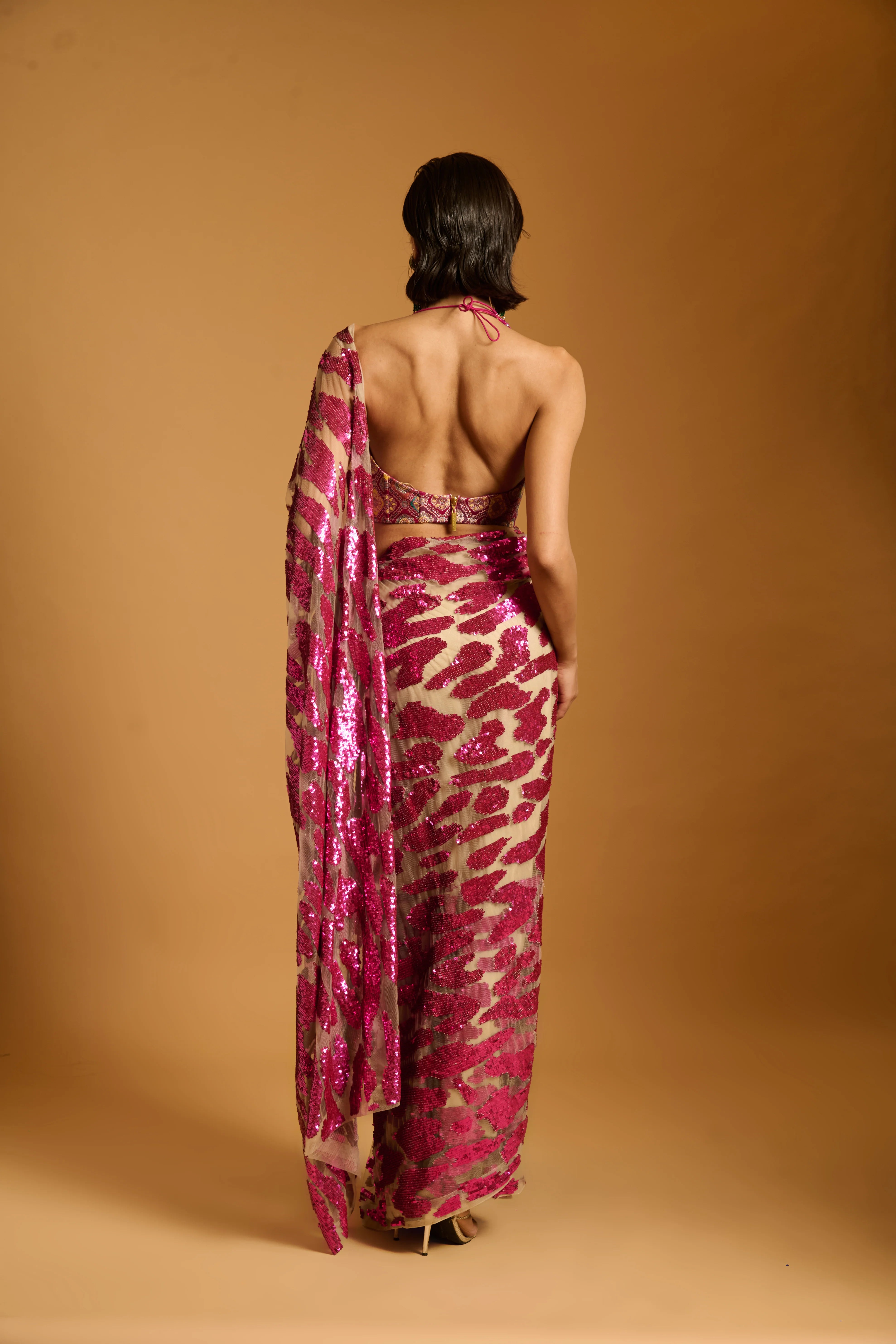 Trifecta fuchsia cheetah saree