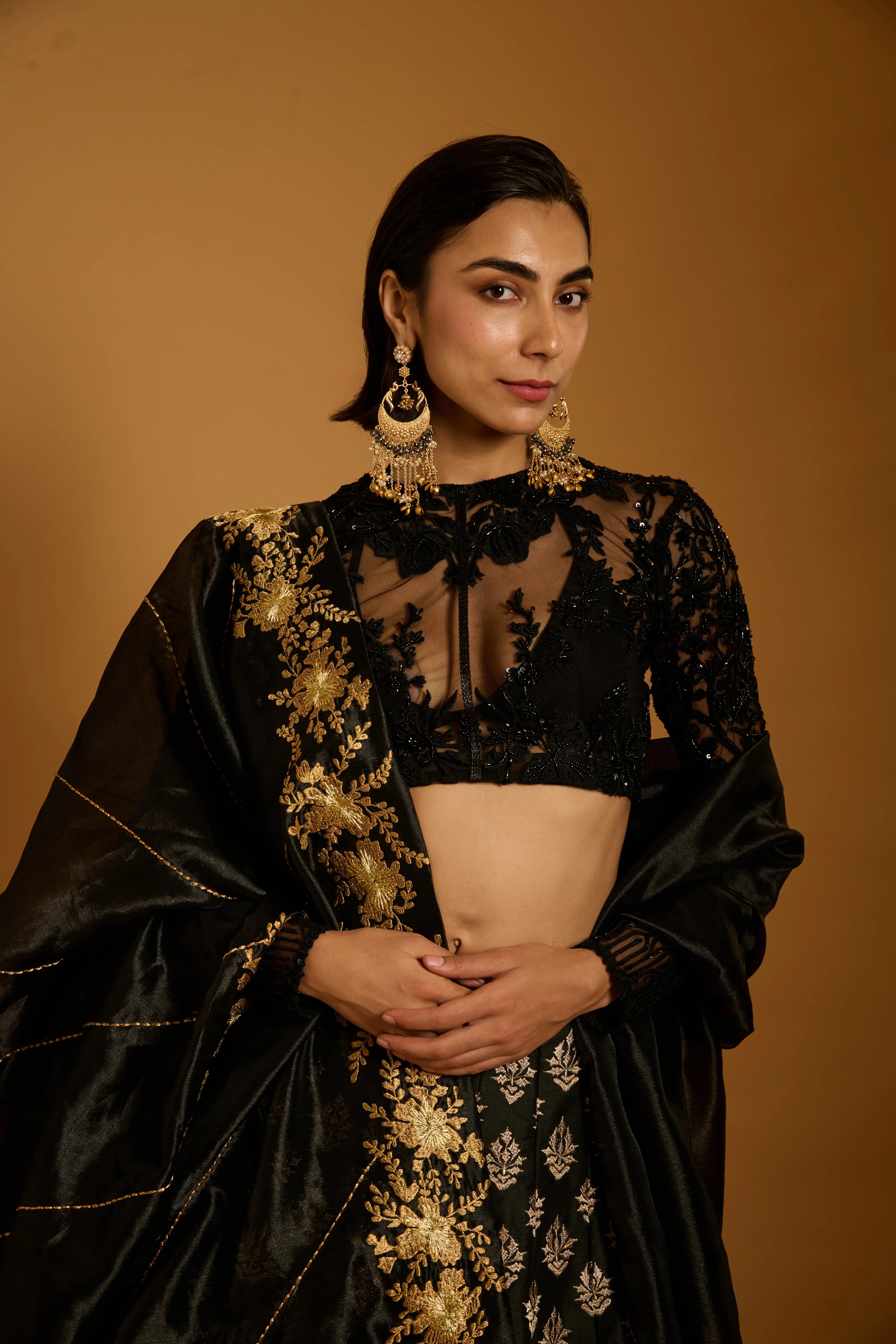 Trifecta black gold zari lehenga
