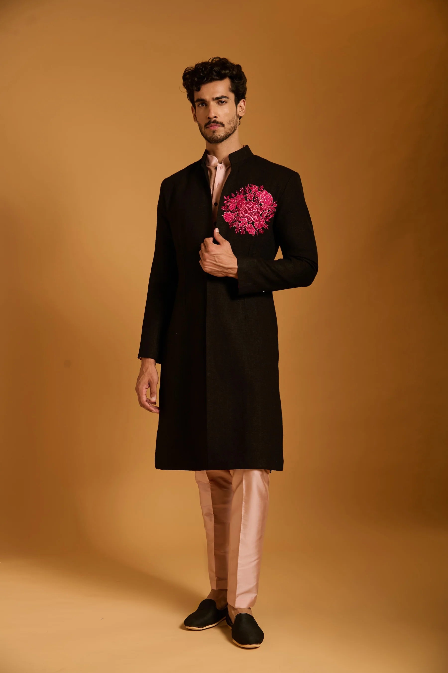 Trifecta black crest sherwani