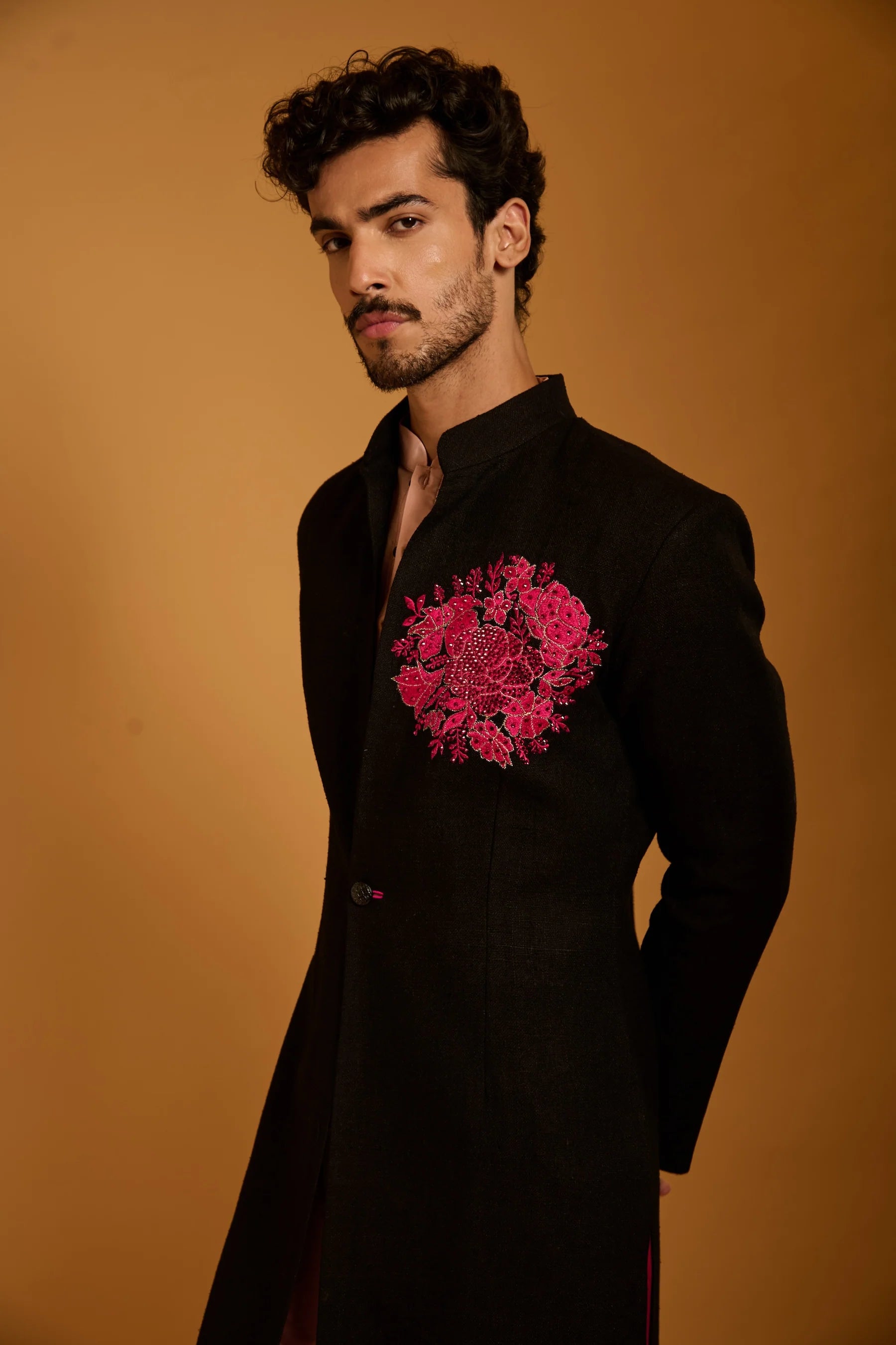 Trifecta black crest sherwani