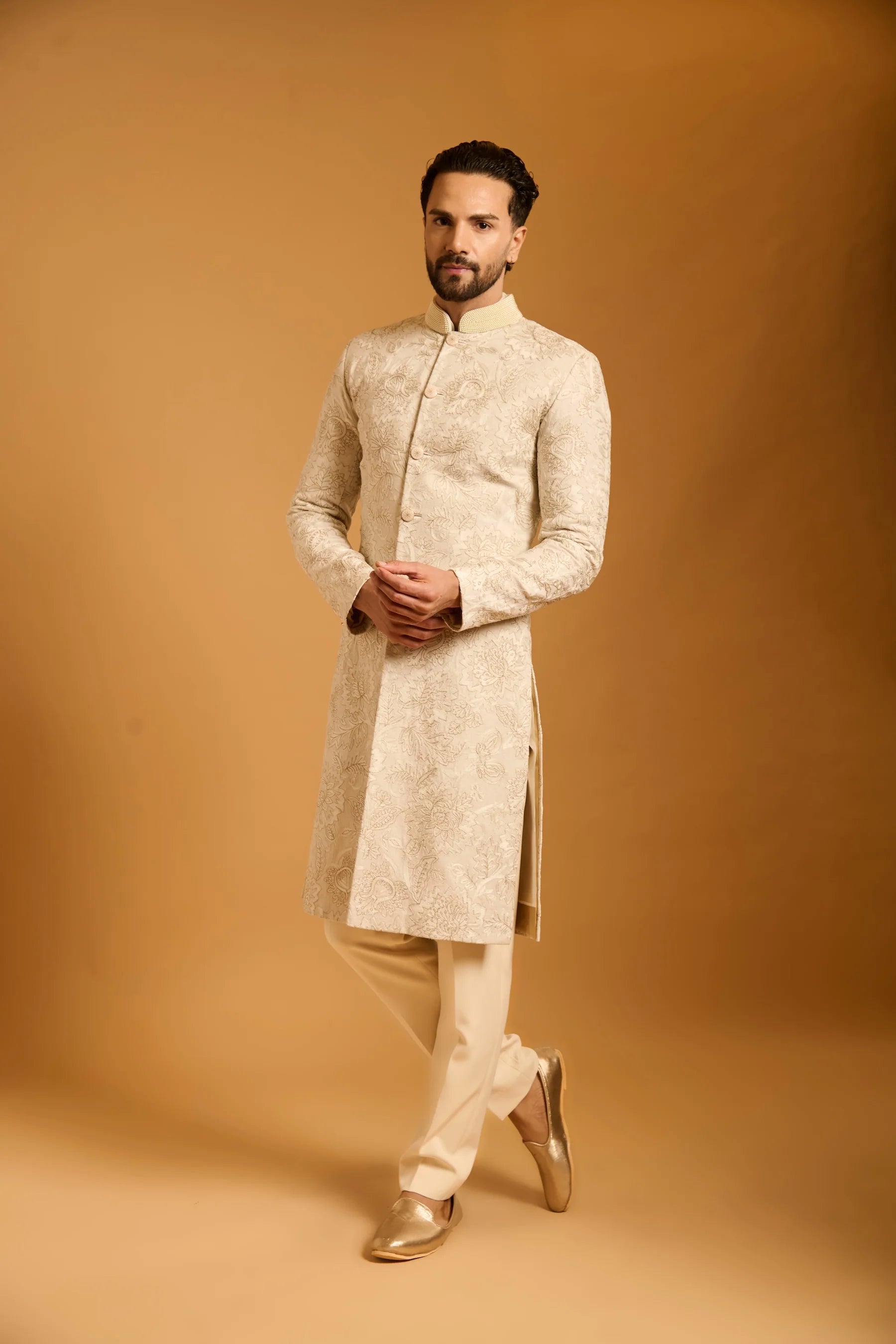 Trifecta ivory pomegranate sherwani