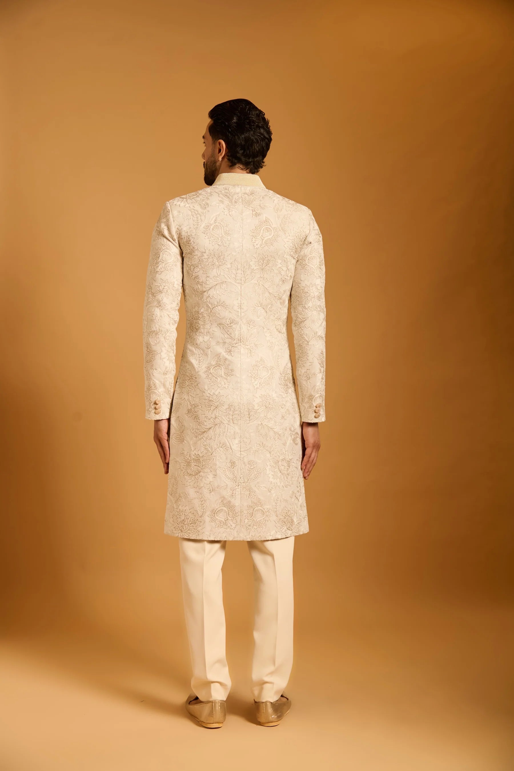 Trifecta ivory pomegranate sherwani