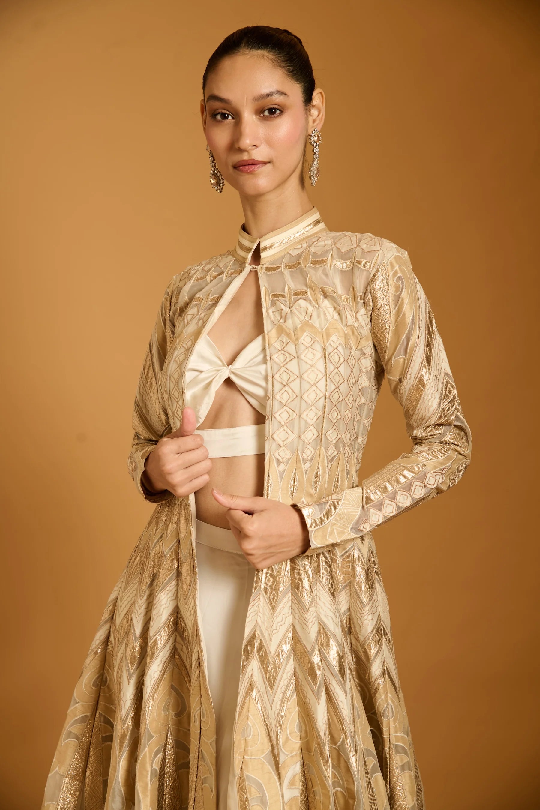 Trifecta ivory applique anarkali jacket.
